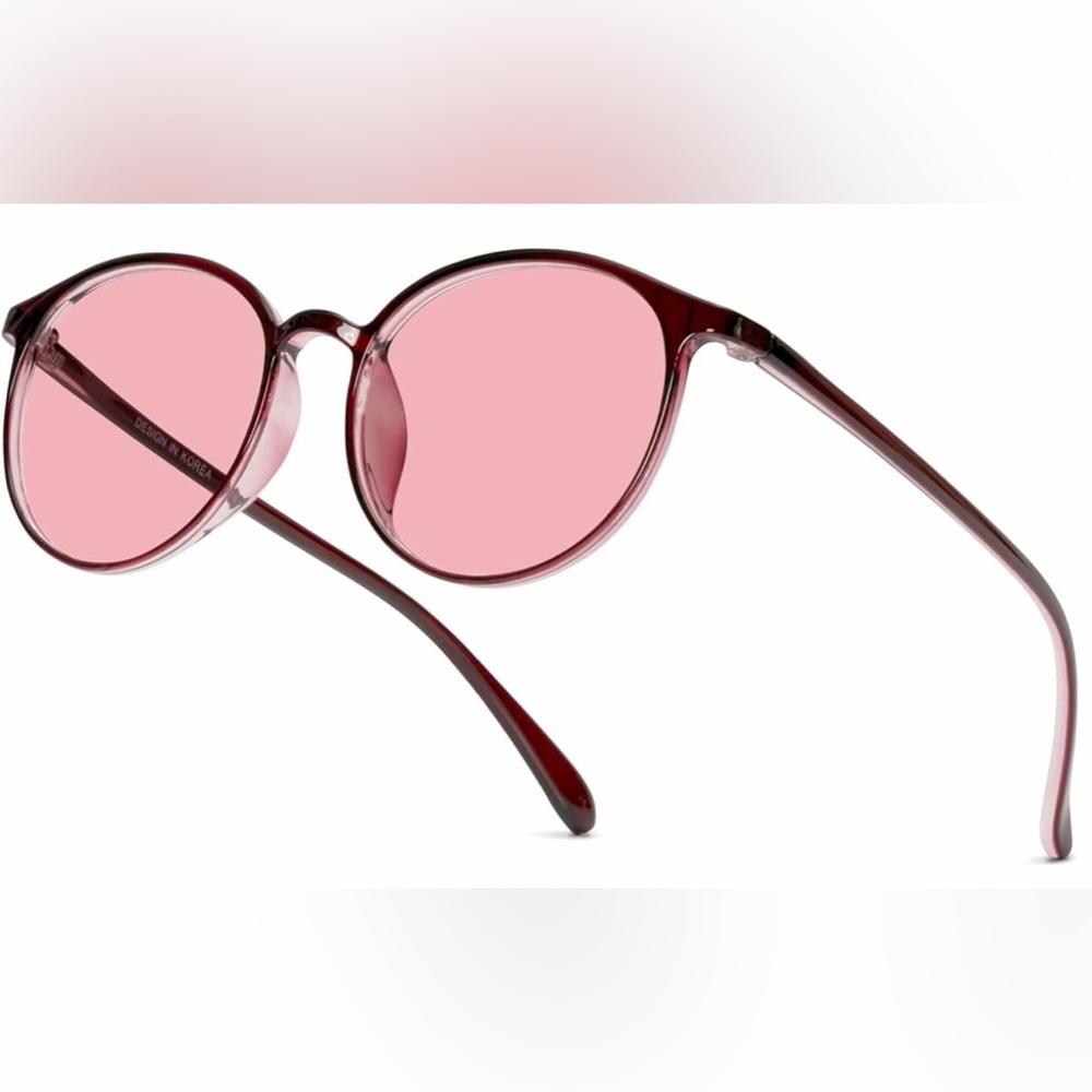 BraddellOptics Rosecolored glasses. Oval/round plastic frame. Non prescription.